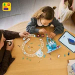 LEGO DISNEY FROZEN AVENTURA CU SANIA PE SINE LA CASTELUL DE GHEATA  AL ELSEI 43281 - imagine 13